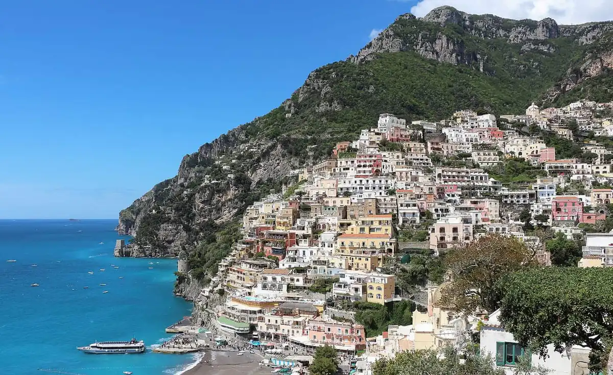 Pastel houses of Positano stacked above the sea on the Amalfi Coast