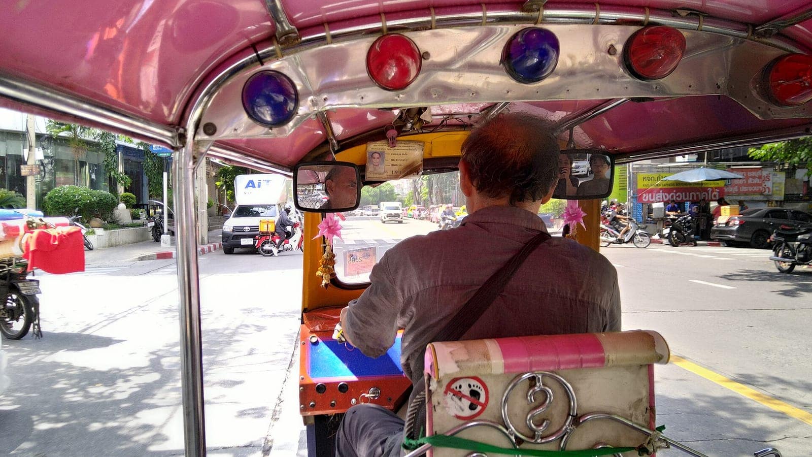 Riding a tuk-tuk through Bangkok